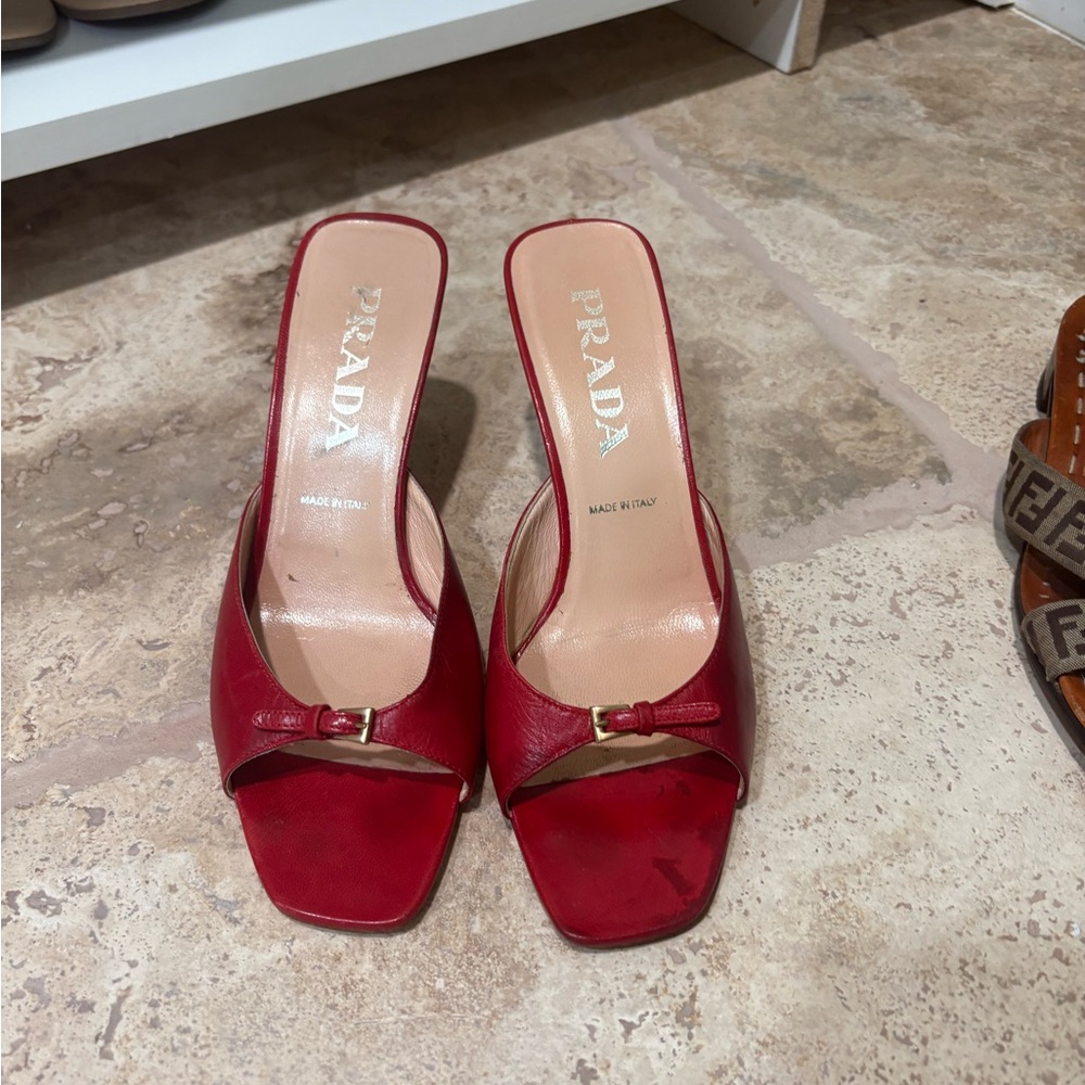 Prada Red Mules with Square Toe and Metal Detail